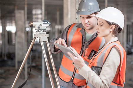 simsearch:614-00383197,k - Female and male surveyor using digital tablet on construction site Stock Photo - Premium Royalty-Free, Code: 614-08488072
