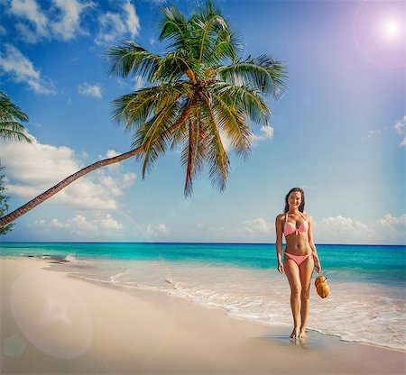 simsearch:851-02964108,k - Portrait of young woman wearing bikini standing on Miami beach, Florida, USA Foto de stock - Sin royalties Premium, Código: 614-08578271