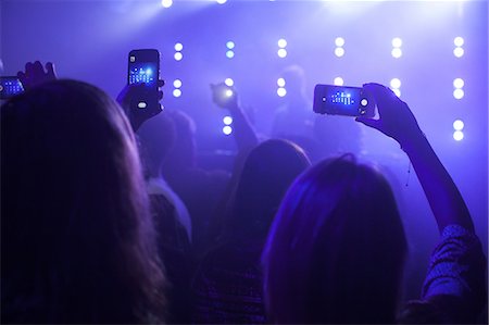 smartphones at a concert - group of people at concert, taking photographs of stage, using smartphones, rear view Stock Photo - Premium Royalty-Free, Code: 614-08578343