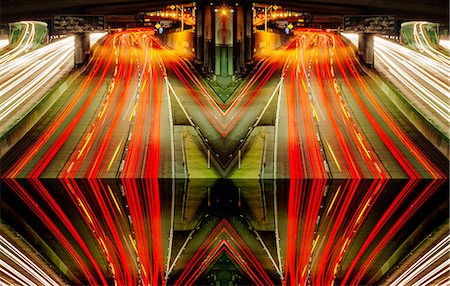 Abstract cityscape, mirror image of highway traffic light trails at night, Los Angeles, California, USA Stock Photo - Premium Royalty-Free, Code: 614-08641730