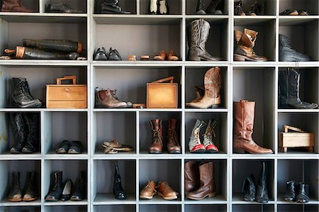 displaying - Display of boots and shoes on shelves in traditional shoe shop Stock Photo - Premium Royalty-Free, Code: 614-08641740
