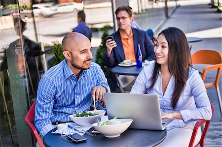 simsearch:614-06813977,k - Business people sitting outside cafe, using laptop Stock Photo - Premium Royalty-Free, Code: 614-08685162