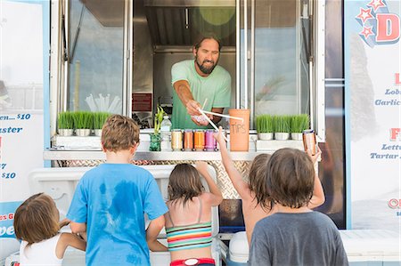 simsearch:614-08726534,k - Group of children queuing at fast food trailer Stock Photo - Premium Royalty-Free, Code: 614-08726517