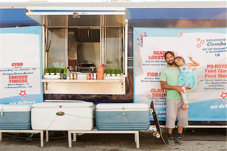simsearch:614-08726534,k - Portrait of father and daughter standing beside fast food trailer Stock Photo - Premium Royalty-Free, Code: 614-08726525