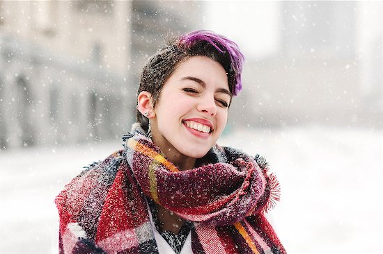 Portrait of young woman standing in front of the Christian Science Centre and Prudential building with snow, Boston, Massachusetts, USA Stock Photo - Premium Royalty-Free, Image code: 614-08720616