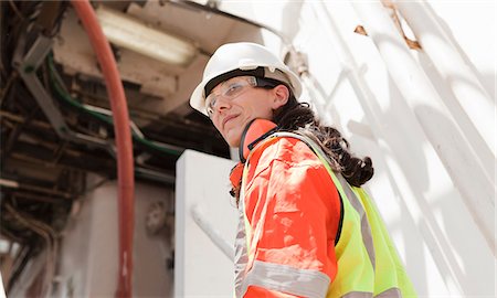 Engineer working on oil rig Stock Photo - Premium Royalty-Free, Code: 614-08720693