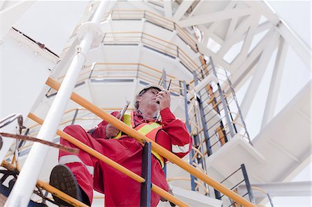 people working on oil rig - Engineer working on oil rig Stock Photo - Premium Royalty-Free, Code: 614-08720702