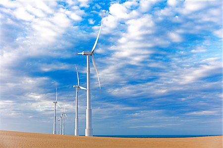 simsearch:649-09258431,k - Row of wind turbines at coast, Taiba, Ceara, Brazil Fotografie stock - Premium Royalty-Free, Codice: 614-08720838