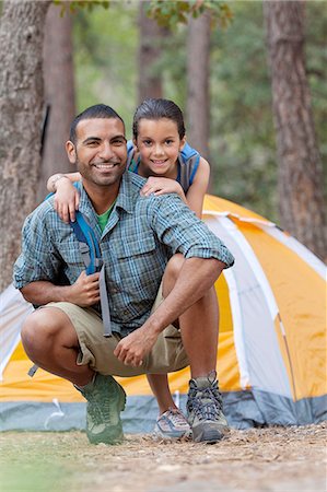 sedona - Portrait of young man and girl camping in forest, Sedona, Arizona, USA Fotografie stock - Premium Royalty-Free, Codice: 614-08821098