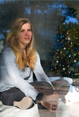simsearch:614-08081431,k - Teen girl looks thinking at christmas Stock Photo - Premium Royalty-Free, Code: 614-08865595