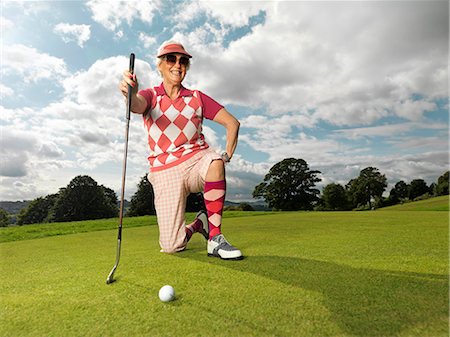 senior women golf - Mature lady playing golf Stock Photo - Premium Royalty-Free, Code: 614-08865672