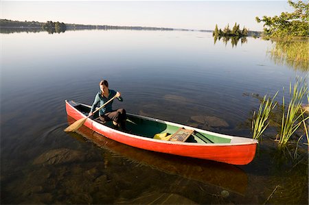 simsearch:614-06720064,k - Woman canoeing in morning light Stock Photo - Premium Royalty-Free, Code: 614-08865893