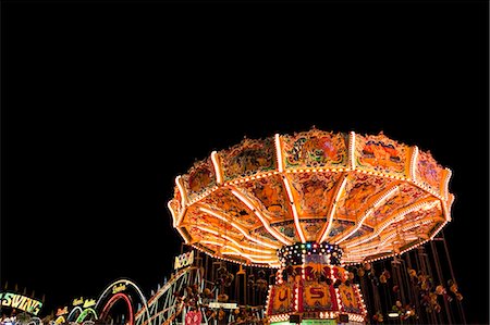 fairground swing ride night - chairoplane at fairground Stock Photo - Premium Royalty-Free, Code: 614-08866047