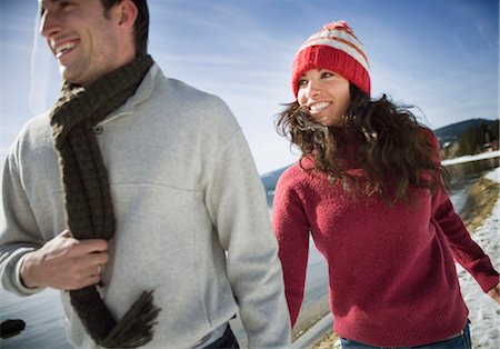simsearch:614-08866253,k - Couple running by snowy lake Stock Photo - Premium Royalty-Free, Code: 614-08866211