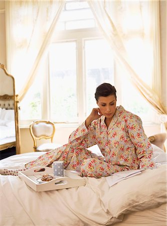 simsearch:614-08865804,k - Young woman in bed wearing pyjamas Stock Photo - Premium Royalty-Free, Code: 614-08866275