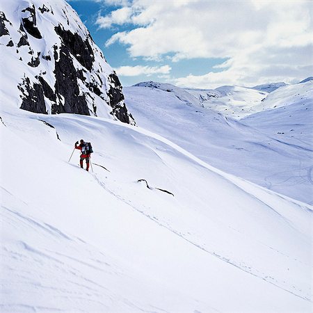 Man skiing on mountain Foto de stock - Sin royalties Premium, Código: 614-08866328