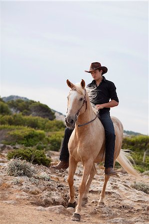 riding her horse bareback - man riding horse Stock Photo - Premium Royalty-Free, Code: 614-08866848