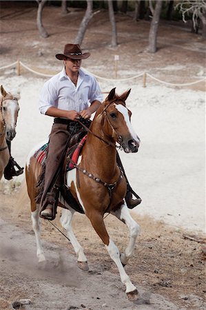 men riding horses Stock Photo - Premium Royalty-Free, Code: 614-08866854