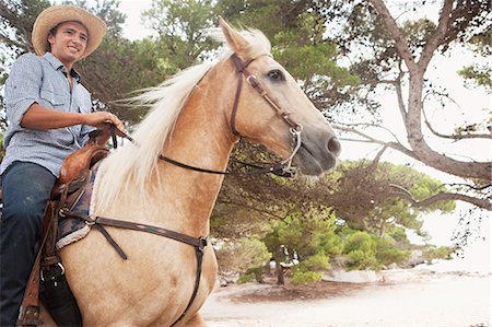 man riding horse Photographie de stock - Premium Libres de Droits, Code: 614-08866861