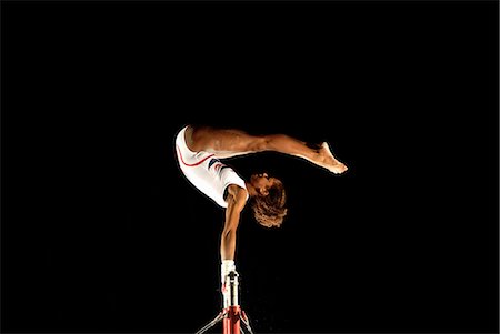 simsearch:6113-06909280,k - gymnast on high bars Stock Photo - Premium Royalty-Free, Code: 614-08867163