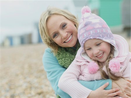 simsearch:6122-07703436,k - Mother and Daughter hugging on beach Stock Photo - Premium Royalty-Free, Code: 614-08867226