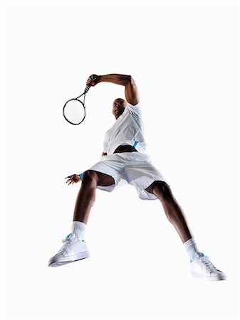 Man playing tennis Stock Photo - Premium Royalty-Free, Code: 614-08867385