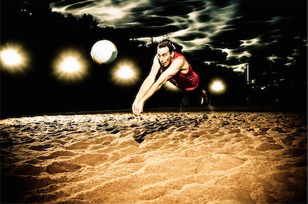 simsearch:649-06433555,k - Young man playing volleyball Stock Photo - Premium Royalty-Free, Code: 614-08867416