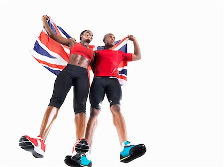 Athletes celebrating with Union Jack Photographie de stock - Premium Libres de Droits, Code: 614-08867410