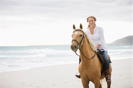 simsearch:614-08870625,k - Girl with brown horse on the beach Stock Photo - Premium Royalty-Free, Code: 614-08867444