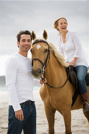 simsearch:614-08870625,k - Man and woman with horse on the beach Stock Photo - Premium Royalty-Free, Code: 614-08867449