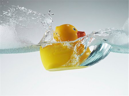 simsearch:6113-06626106,k - Rubber duck floating in soapy water Stock Photo - Premium Royalty-Free, Code: 614-08868131