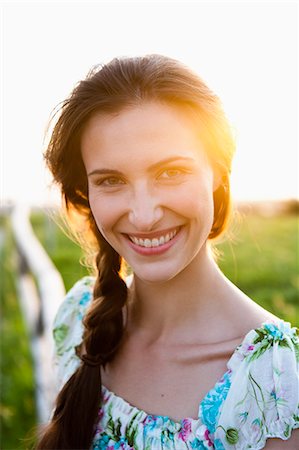 Close up of woman's smiling face Stock Photo - Premium Royalty-Free, Code: 614-08868358