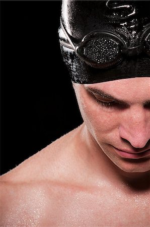 simsearch:649-09206953,k - Close up of swimmer wearing cap Fotografie stock - Premium Royalty-Free, Codice: 614-08868403