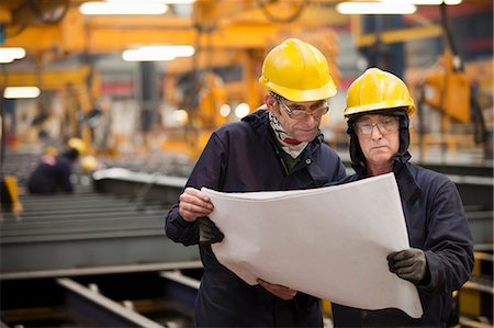 simsearch:614-06814032,k - Workers reading blueprints in shipyard Stock Photo - Premium Royalty-Free, Code: 614-08868457