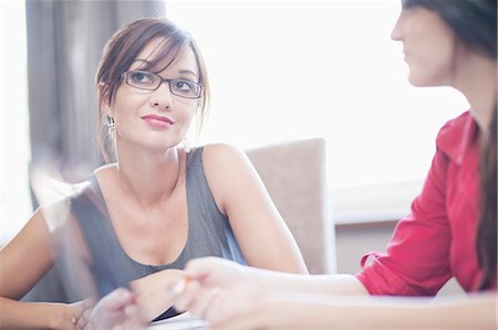 simsearch:614-08827381,k - Businesswomen at conference table Stock Photo - Premium Royalty-Free, Code: 614-08868605