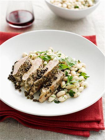 simsearch:614-08870294,k - Plate of chicken with capers and beans Stock Photo - Premium Royalty-Free, Code: 614-08868863
