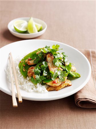simsearch:649-09206084,k - Plate of chicken with rice and herbs Fotografie stock - Premium Royalty-Free, Codice: 614-08868873