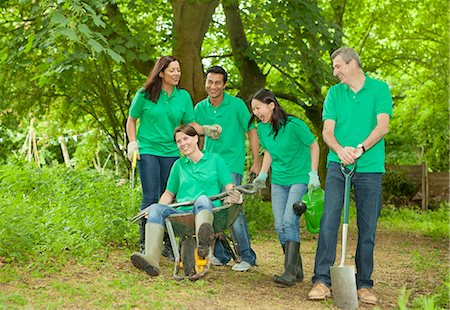 Gardeners playing together in park Stock Photo - Premium Royalty-Free, Code: 614-08868928