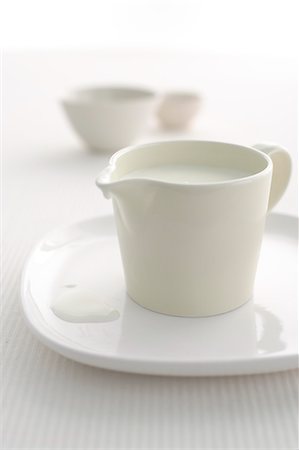 Close up of pitcher of milk Stock Photo - Premium Royalty-Free, Code: 614-08869284