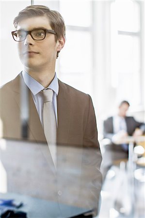 simsearch:614-08869065,k - Businessman standing in hallway Stock Photo - Premium Royalty-Free, Code: 614-08869360