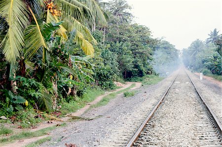 simsearch:614-08869465,k - Train tracks on gravel road Photographie de stock - Premium Libres de Droits, Code: 614-08869462