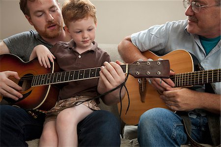 simsearch:614-08983239,k - Father teaching son to play guitar, with grandfather Stock Photo - Premium Royalty-Free, Code: 614-08874027