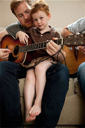 simsearch:614-02640837,k - Father teaching son to play guitar Stock Photo - Premium Royalty-Free, Code: 614-08874028