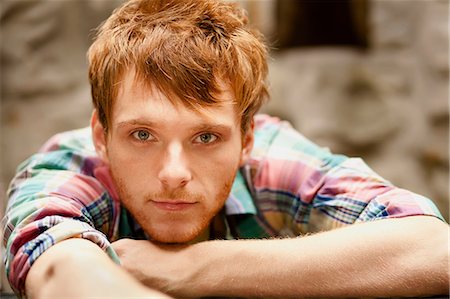 simsearch:649-08125287,k - Portrait of young man with chin on hand Stock Photo - Premium Royalty-Free, Code: 614-08874048