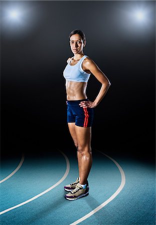 simsearch:614-07194381,k - Portrait of female athlete on running track Stock Photo - Premium Royalty-Free, Code: 614-08874311