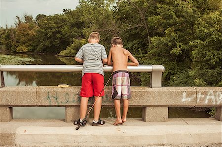 simsearch:614-06336452,k - Boys on bridge with fishing rod Stock Photo - Premium Royalty-Free, Code: 614-08874345