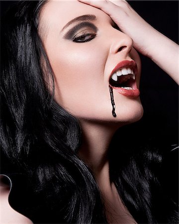 Young female vampire Stock Photo - Premium Royalty-Free, Code: 614-08874352