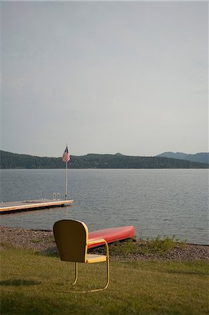 empty chair on dock - Empty chair, Lake Pend Oreille, Idaho, USA Stock Photo - Premium Royalty-Free, Code: 614-08874834