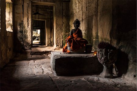 simsearch:614-08875205,k - Buddha statue at the Ta Prohm Temple ruins at  Angkor Wat, Siem Reap, Cambodia Stock Photo - Premium Royalty-Free, Code: 614-08875209