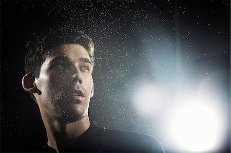 Close up portrait of young male soccer player Foto de stock - Sin royalties Premium, Código: 614-08875709